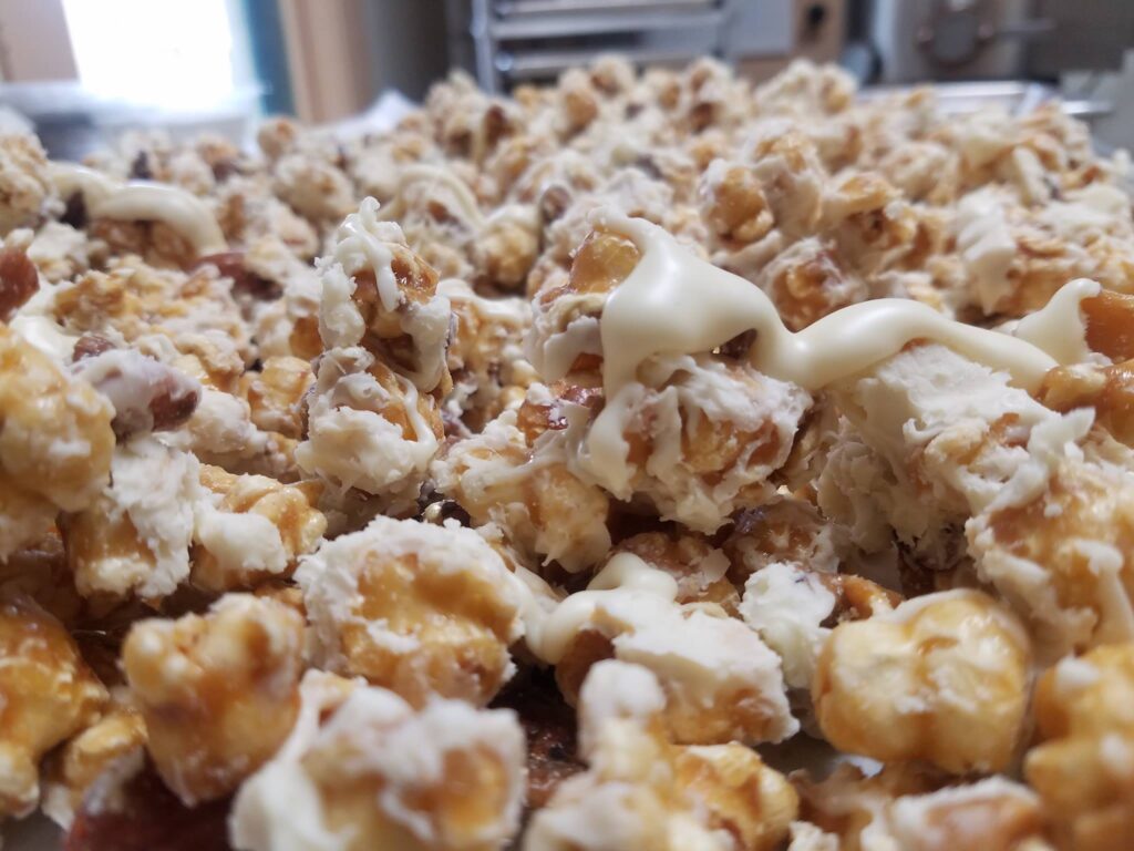 white chocolate drizzled caramel corn