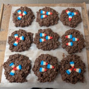 a board full of chocolate Eagles krispy nests